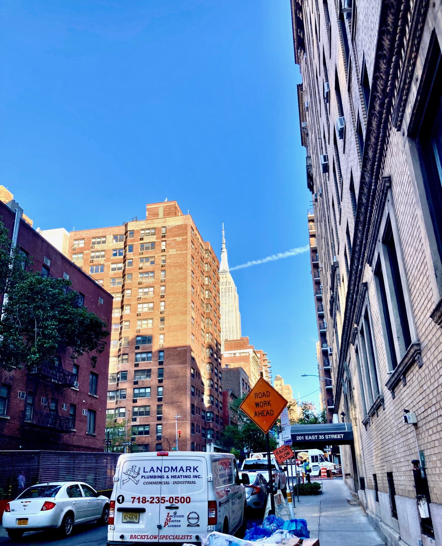 A street sign on the side of a building.